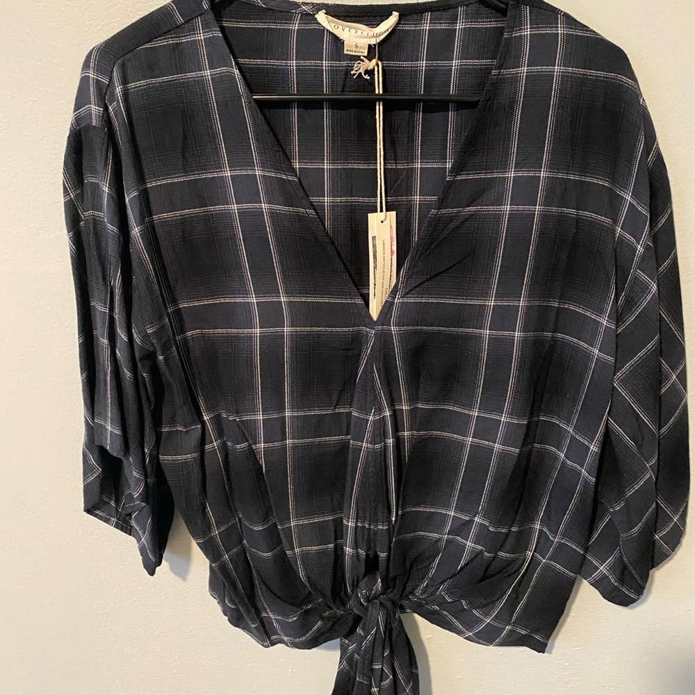 Tops selling each for $8 each
